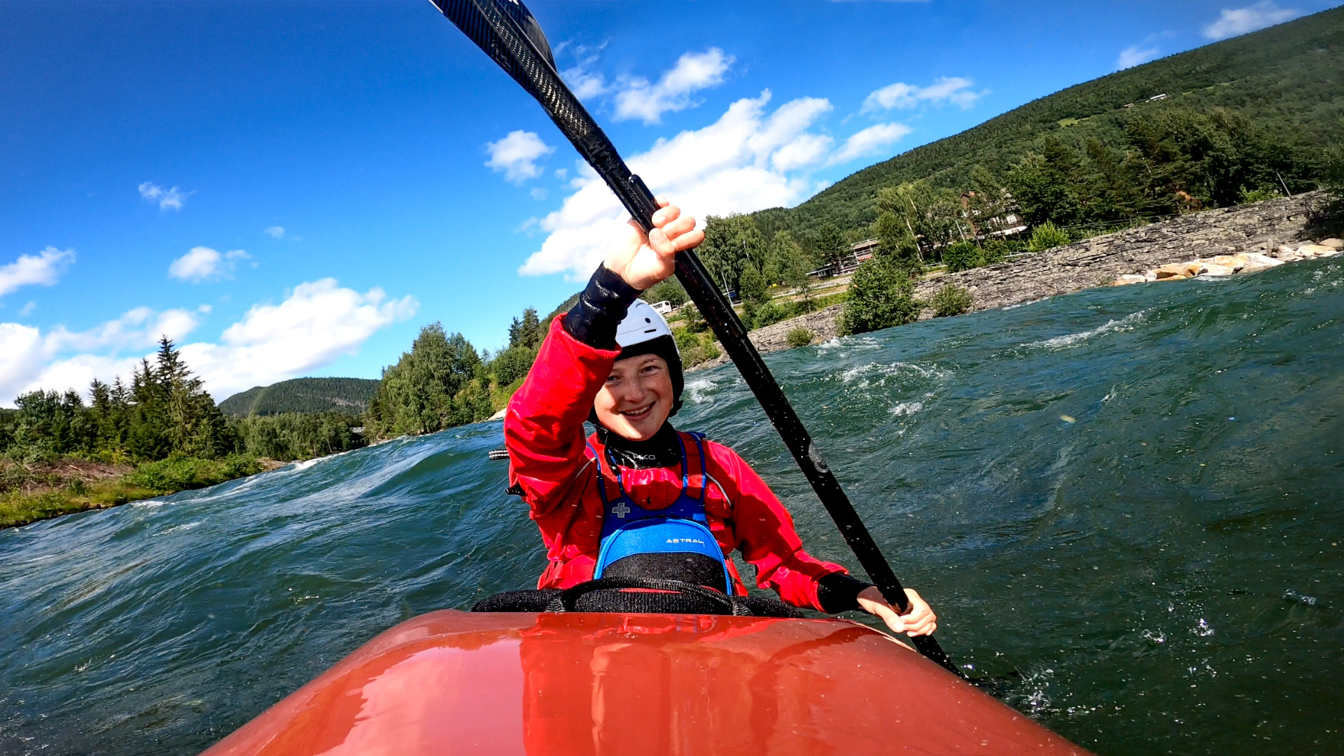 Whitewater kayaking on waves of the Sjoa Playrun section in Norway, GoPro shot.