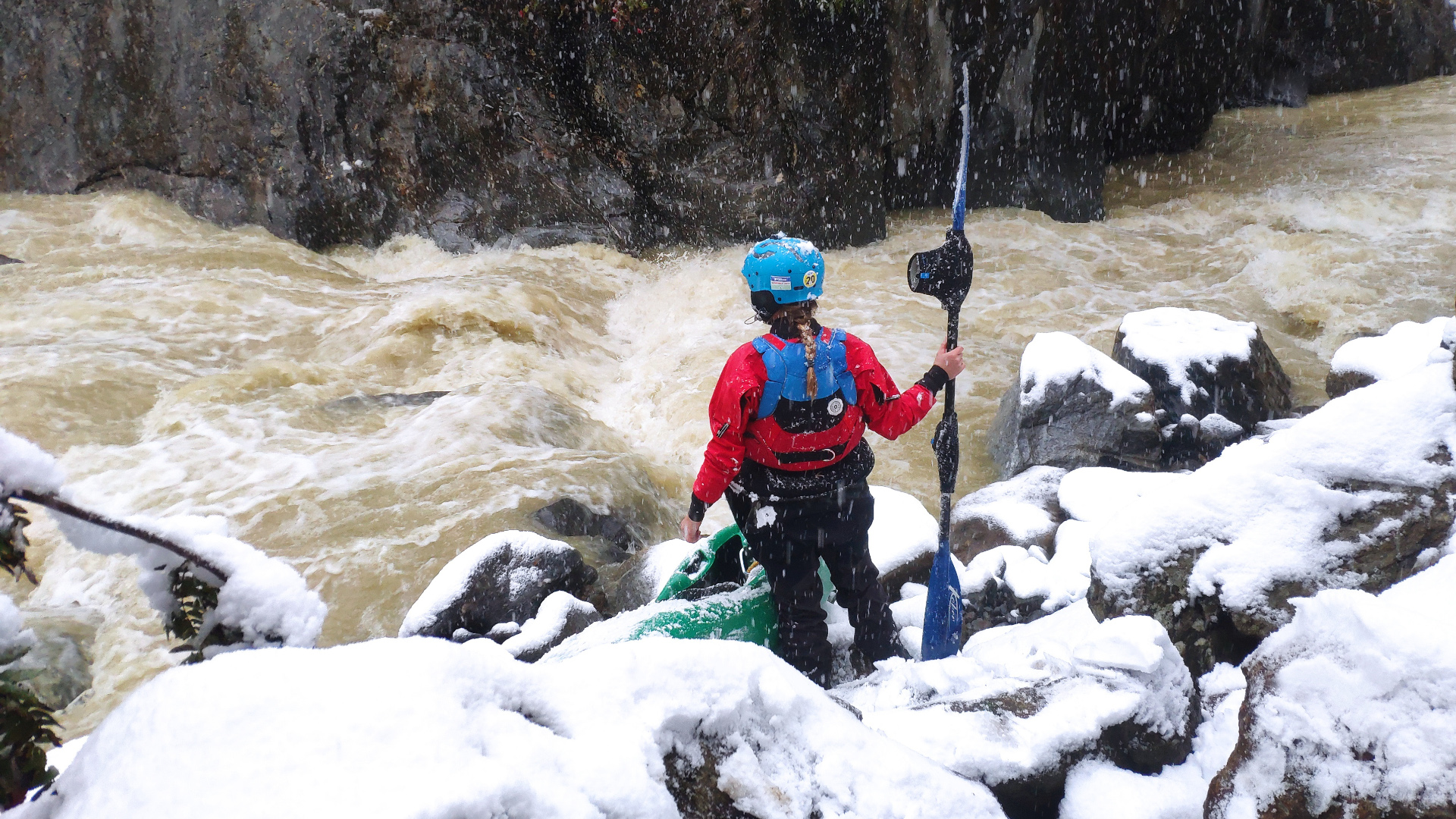 Snowy day whitewater kayaking, Venter, Austria.